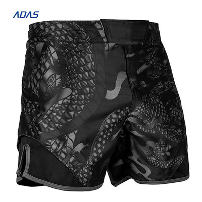 comprar Sublimado MMA Muay Thai Lucha masculina pantalones cortos de poliéster teñidos ropa deportiva OEM online manufacture
